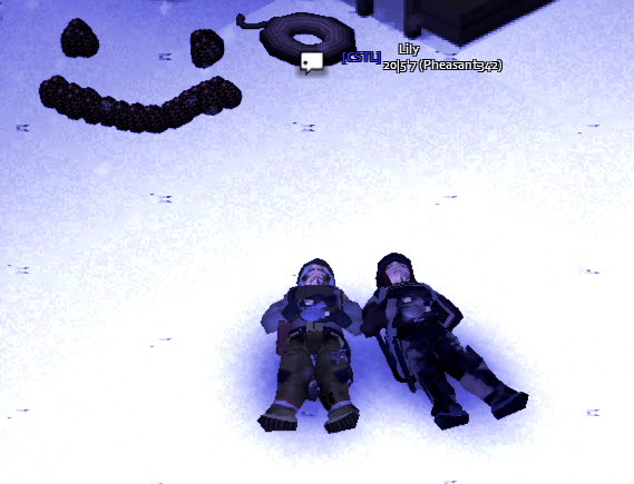 Putie (left) and Lily (right) laying together in the snow, 19/01/1995